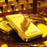 Oro raggiunge nuovo record di 4.600 dollari: tensione Trump‑Powell scuote i mercati