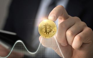 Bitcoin scende a 72.000 USD: minimo degli ultimi 15 mesi in un clima di avversione al rischio
